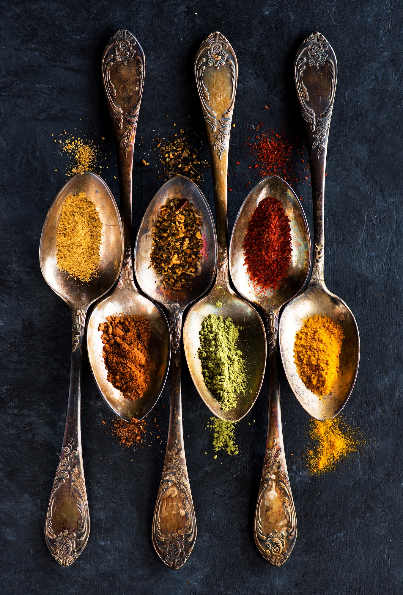Powder seasoning, spices and spicy in spoons
